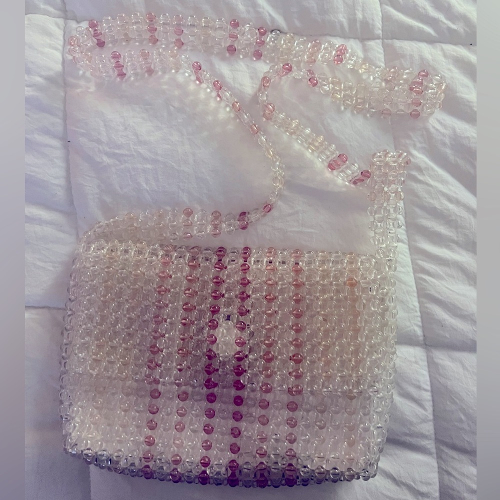 Pink white and clear bag